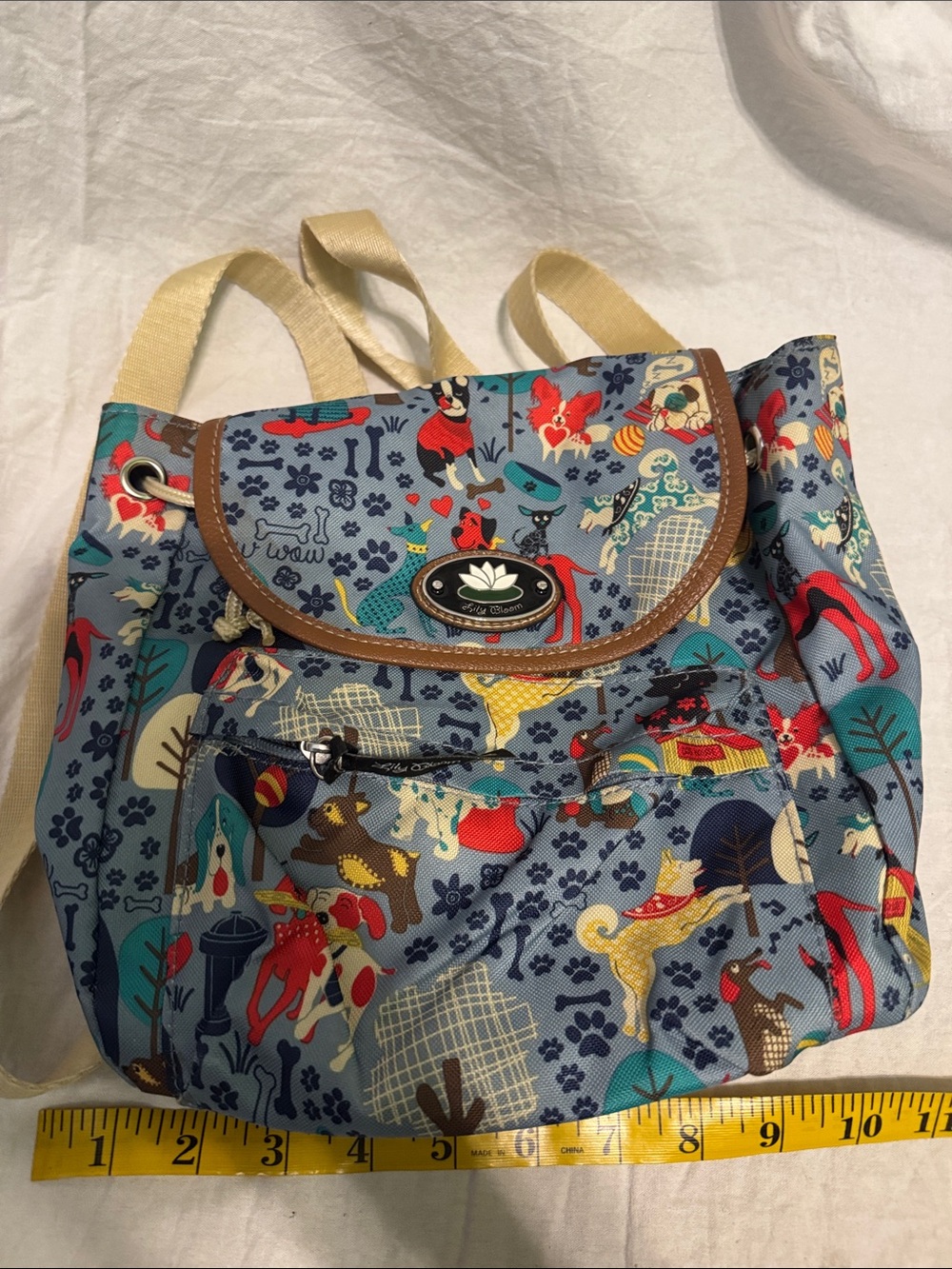 Lily Bloom Blue Canvas Backpack with Multicolor Dog Print